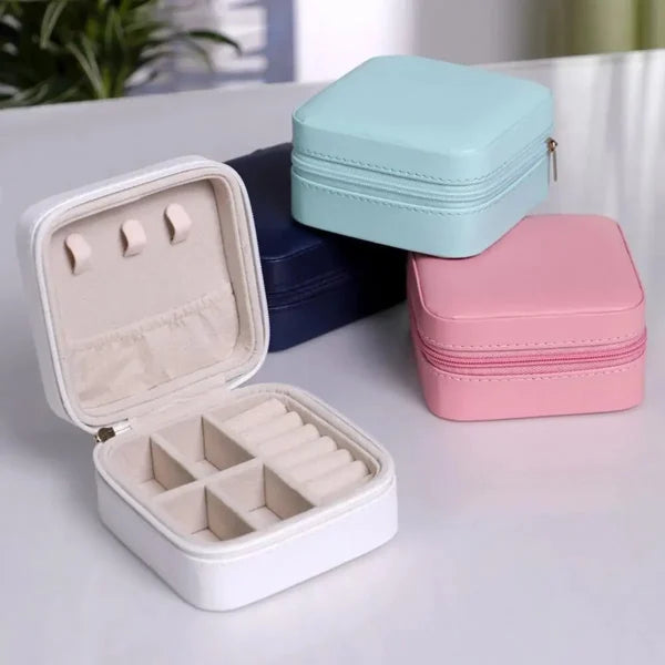 Leather jewelry storage box with stand for earrings, rings, and cosmetics. Random color.